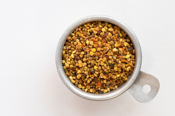 Bee Pollen in a Measuring Cup