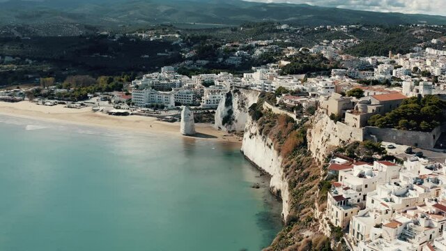 Aerial view on a Italian coast with town and beach.
