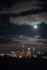 Fototapeta na wymiar Cleveland Ohio Skyline at night during a full moon