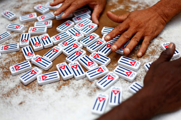 Naklejka premium I play dominoes in Havana, Cuba. June 18, 2016