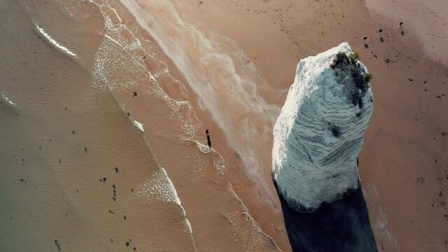 Aerial view on a big rock on a beach,