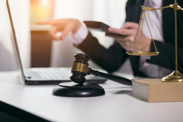 Male lawyer or judge wearing  protective mask on the consult having team meeting with client, Law and Legal services concept