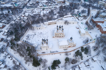 Above the Holy Trinity Makaryevo-Unzhensky Monastery in January evening (shot from a quadcopter). Makariev. Kostroma region, Russia
