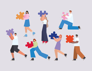 group of people with puzzle pieces on a gray background