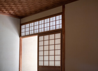 Washi paper used as Japanese shōji screen door on a Kōshi wooden lattice frame.
