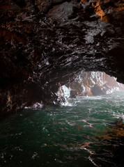 Cave inside rocky cliff formations at Sandanbeki Cliff in Shirahama, Wakayama Prefecture, Japan.
