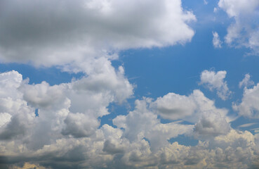 Background of blue sky with white clouds.