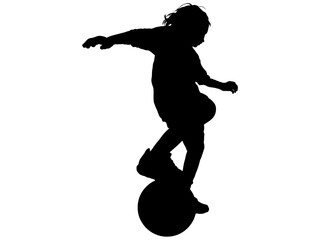 Fototapeta na wymiar ボールをさばくサッカー少年のシルエット