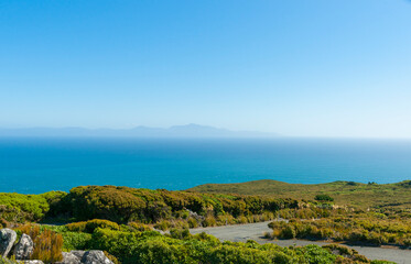 Fototapeta na wymiar Shadow of Sterart Island on horizon from Bluff Hill lookout