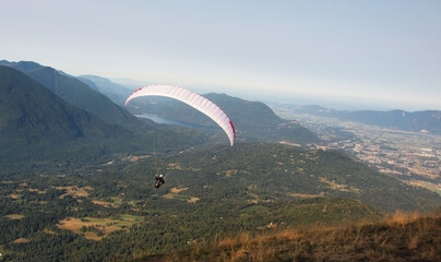 Paraglider launching from Mount Elk in Canada