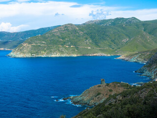 Fototapeta na wymiar Panorama view of the rocky coastline and mediterranean sea, Cap Corse, Corsica, France. Tourism and vacations concept.