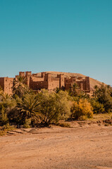 Fototapeta na wymiar Vertical view of the ancient Kasbah (fortress) in the town of Aid Benhaddou in the desert in Morocco