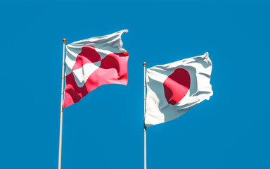 Flags of Greenland and Japan.