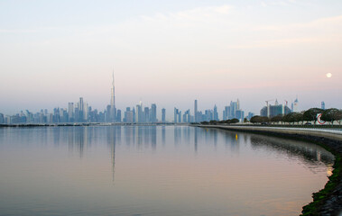 Naklejka premium Dubai, UAE - 01.29.202 Sunrise over Dubai city skyline. Outdoors