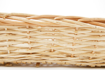 a rattan basket isolated on white background
