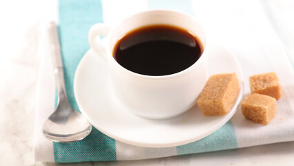 coffee cup and brown cane sugar