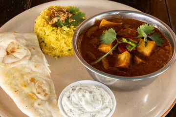 Chicken Tikka Masala with rice and Naan bread