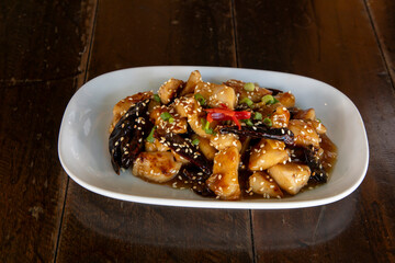 Kung Pao Chicken topped with sesame