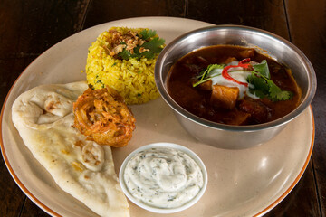 Madras Curry with Pilaf Rice and Naan Bread