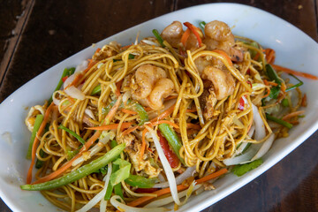Singaporean noodles with shrimps and vegetables