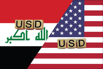 Iraq and USA currencies codes on national flags background