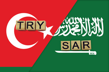 Turkey and Saudi Arabia currencies codes on national flags background