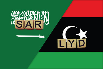 Saudi Arabia and Libya currencies codes on national flags background