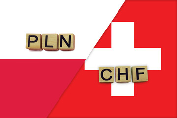 Poland and Switzerland currencies codes on national flags background