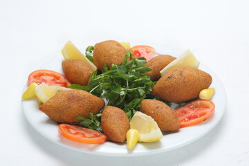 
stuffed meatballs minced meat, onion and walnuts in bulgur