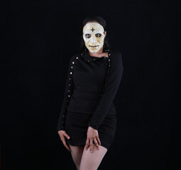 portrait of a scary nun on a black background