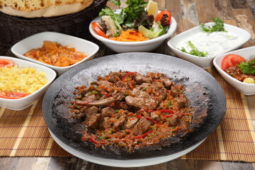 Roasted lamb meat in turkish wok