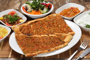 turkish pitta with minced meat tomato parsley and onion