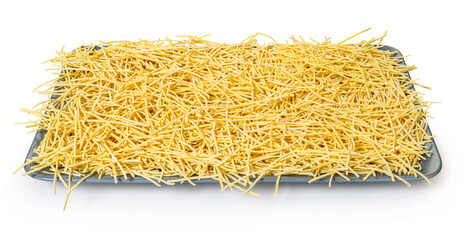 raw pasta noodles on white isolated background