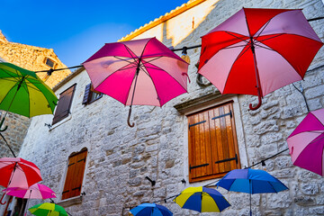 Decorative umbrellas to fight the sun in the courtyard