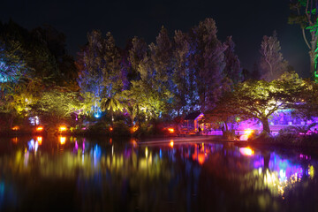 Pukekura Park, New Plymouth, New Zealand. The trees around the lake are beautifully illuminated for the annual Festival of Lights 