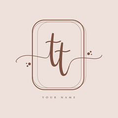 TT Initial handwriting logo. Hand lettering Initials logo branding, Feminine and luxury logo design isolated on elegant background.