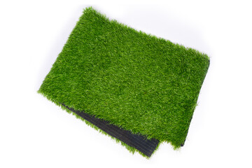 artificial grass for sports fields,green plastic grass on white background.