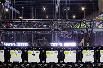Professional video led screens and stage lighting equipment are clamped on a steel trusses. Moving...