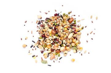 Mixed dry organic cereal and grain seed pile on white background consisted of wheat, black eye pea,...