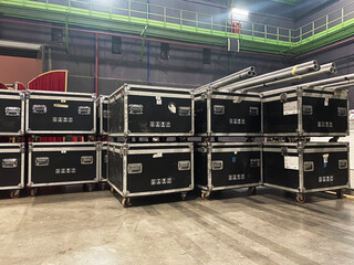 Protective transport touring flight cases for professional concert equipment.