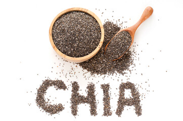 Dry organic chia seeds in wooden bowl and spoon on white background