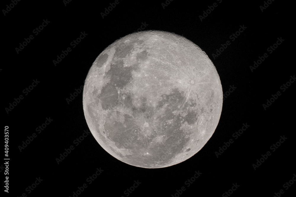 Wall mural full moon stack dark night sky. the full moon is lunar phase when it appears fully illuminated from 