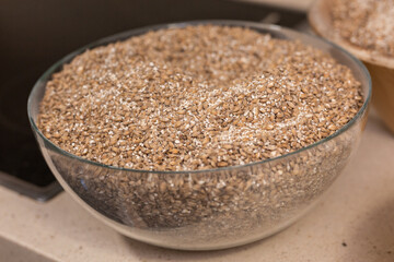 bowls with barley malt and wheat malt for brewing beer