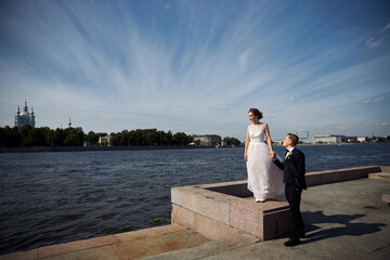 bride and groom on the bridge