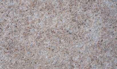 Stone background. blue gravel. Granite texture. The rocky road. Construction material. The texture of the stones. Wallpaper with fine gravel.