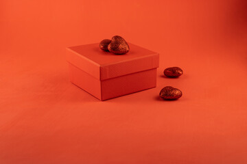 Red gift box and shiny hearts