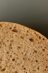 Wheat-rye bread with bran, fresh, sliced.