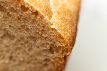 Wheat-rye bread with bran, fresh, sliced.