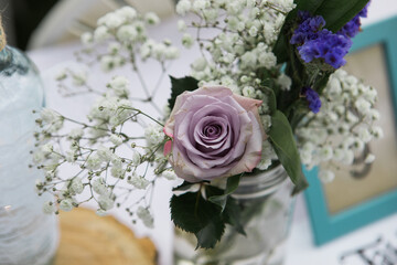 light purple fresh rose in a bouquet with babies breath ; gift of love