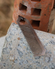 Handmade metal comb for beard.